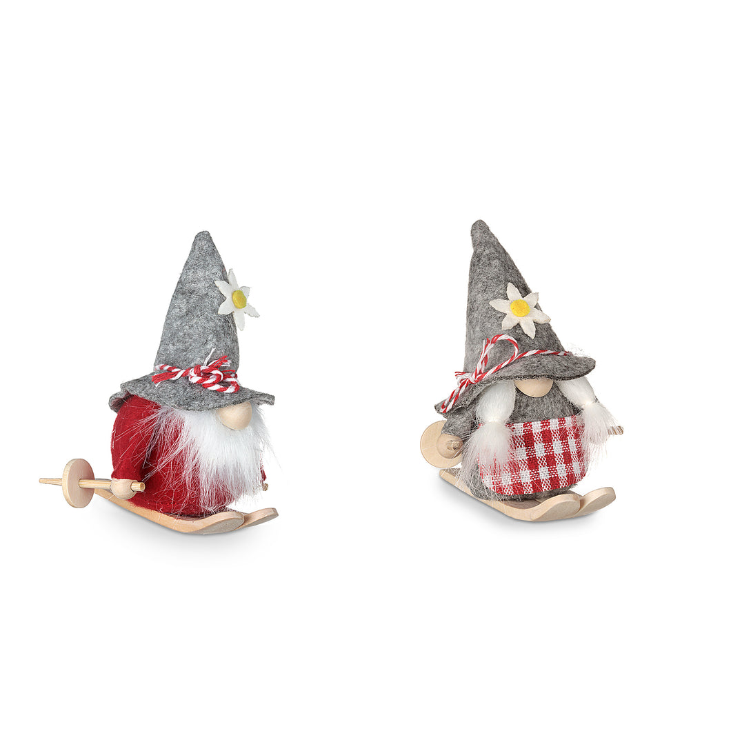 Assortimento gnometti tirolesi rossi su sci